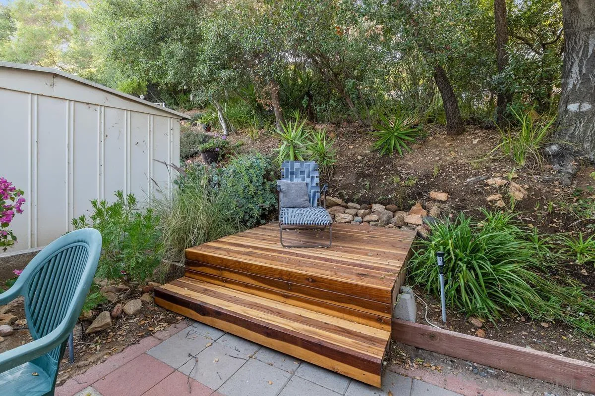 4747 Oak Crest Road, Unit 39 Fallbrook, CA 92028 - Photo 26 of 38 a garden view with a seating space