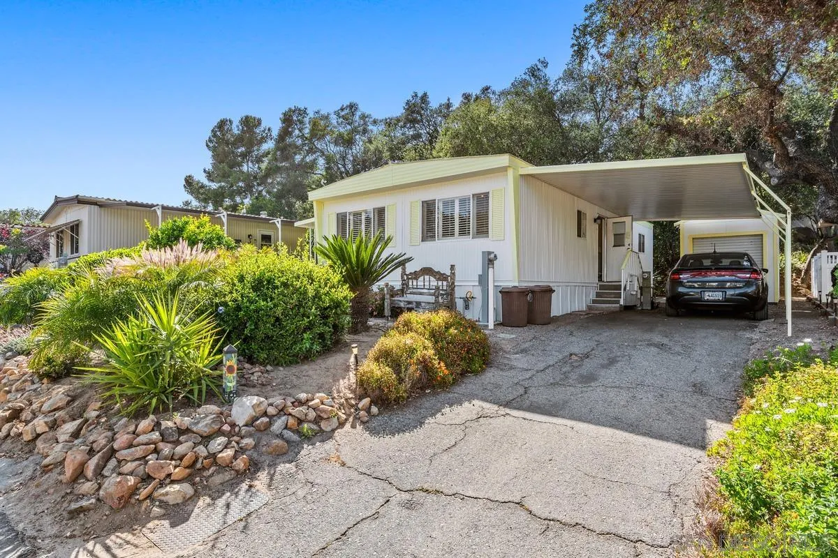 4747 Oak Crest Road, Unit 39 Fallbrook, CA 92028 - Photo 4 of 38 a car parked in front of a house