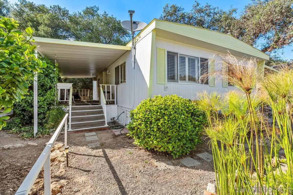 4747 Oak Crest Road, Unit 39 Fallbrook, CA 92028 - Photo 7 of 38 a view of a house with a yard
