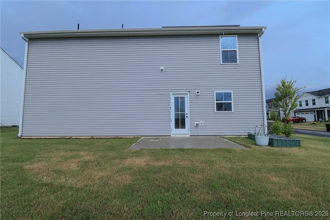 96 Cutty Way Lillington, NC 27546 - Photo 16 of 37 a view of a backyard