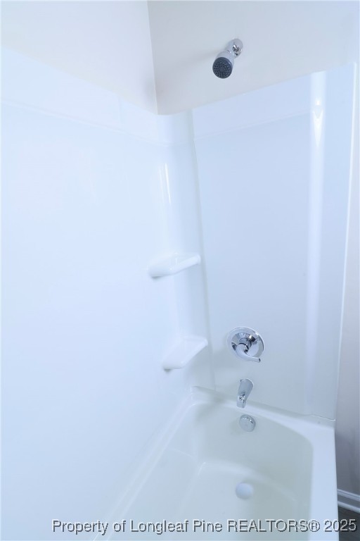 96 Cutty Way Lillington, NC 27546 - Photo 28 of 37 a bathroom with a bathtub