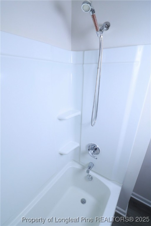 96 Cutty Way Lillington, NC 27546 - Photo 33 of 37 a bathroom with a sink and shower