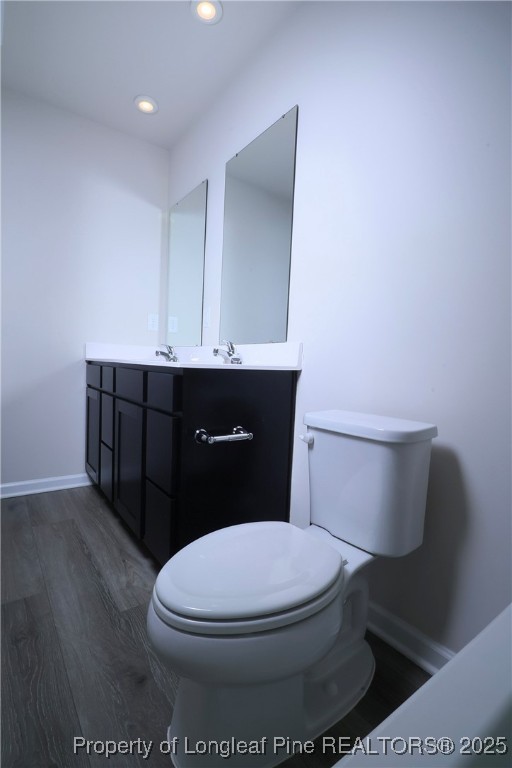 96 Cutty Way Lillington, NC 27546 - Photo 34 of 37 a bathroom with a toilet and a sink