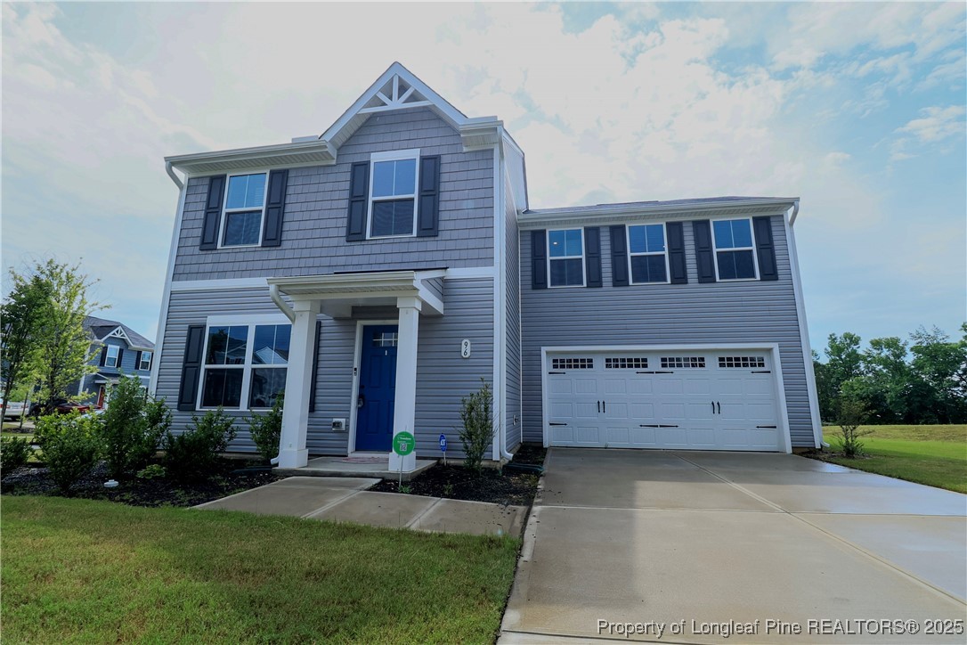 96 Cutty Way Lillington, NC 27546 - Photo 5 of 37 a view of a house with a yard