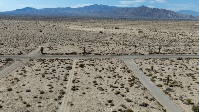 a view of ocean and a mountain