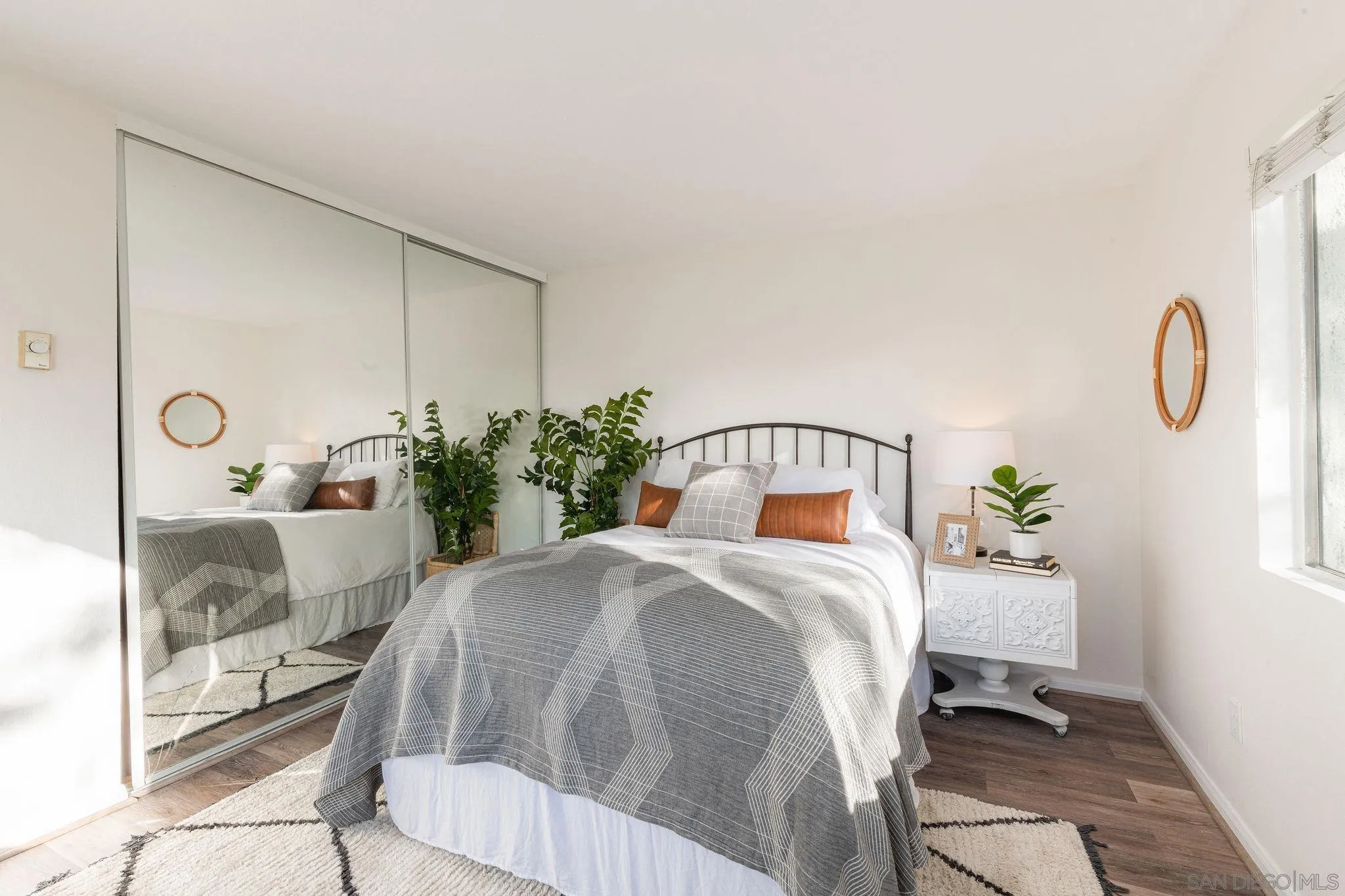 10235 Madrid Way, Unit 138 Spring Valley, CA 91977 - Photo 18 of 21 a bedroom with a bed and window