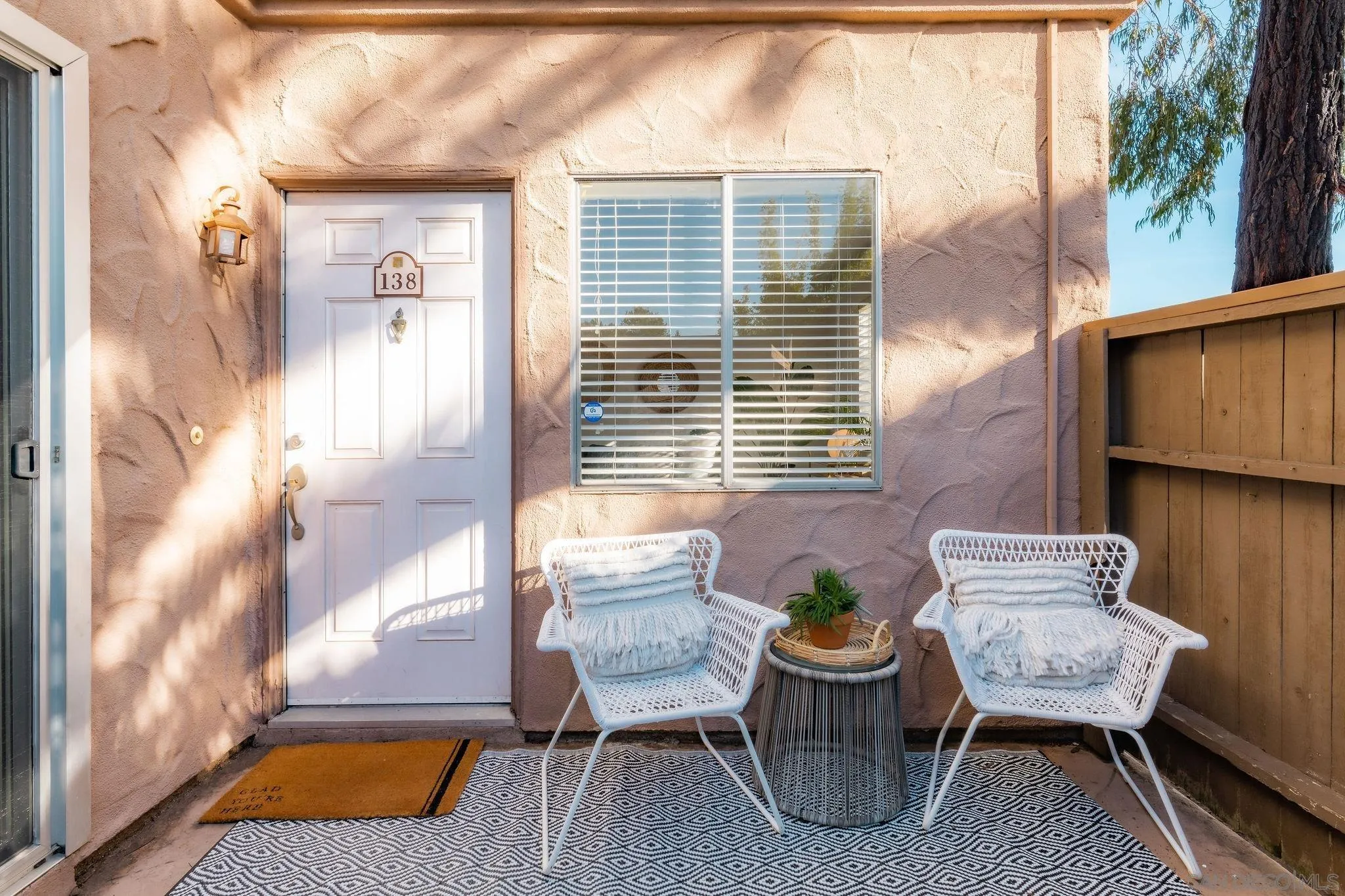 10235 Madrid Way, Unit 138 Spring Valley, CA 91977 - Photo 3 of 21 a balcony with table and chairs