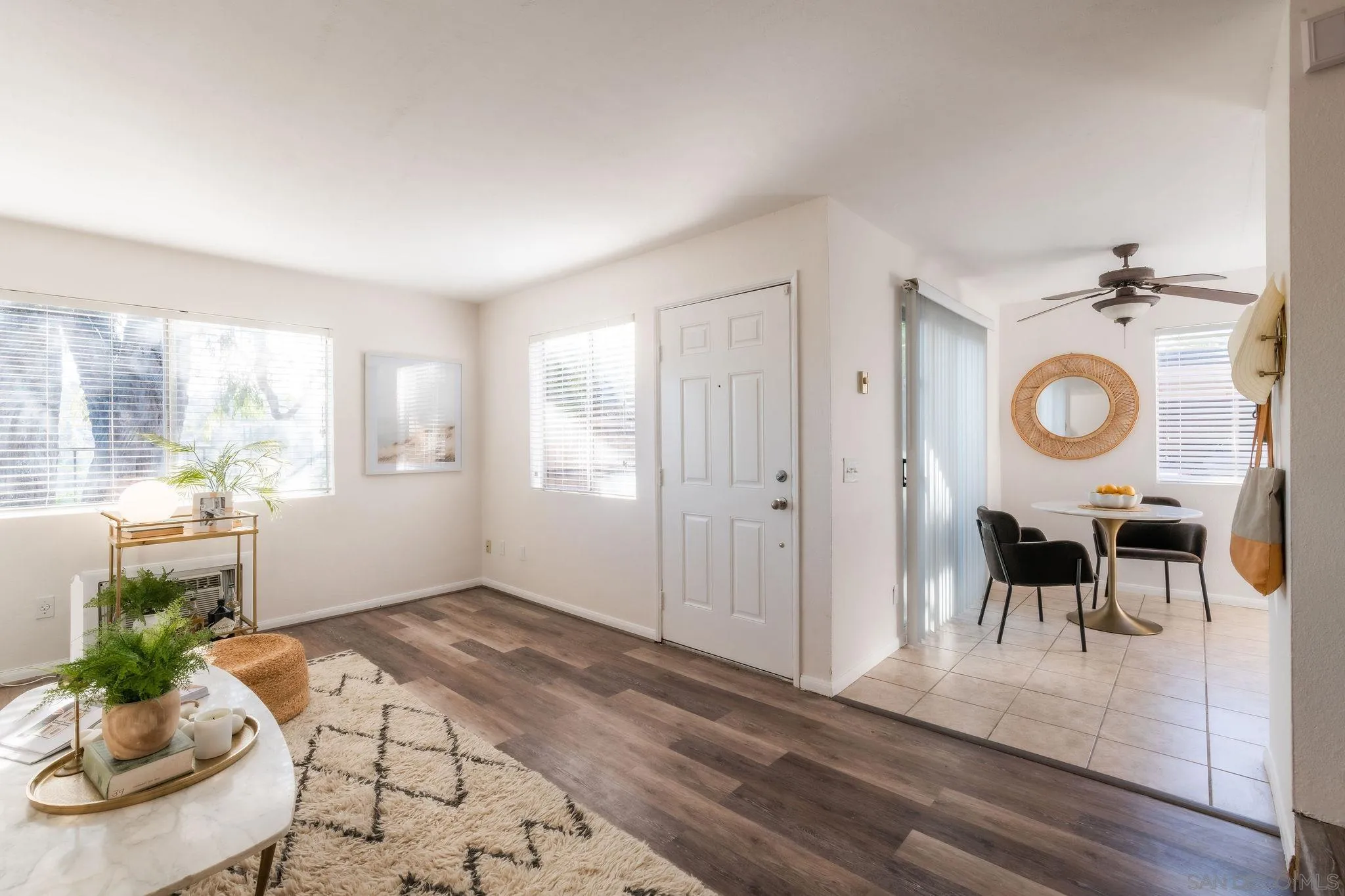 10235 Madrid Way, Unit 138 Spring Valley, CA 91977 - Photo 5 of 21 a view of a livingroom with furniture wooden floor and a window