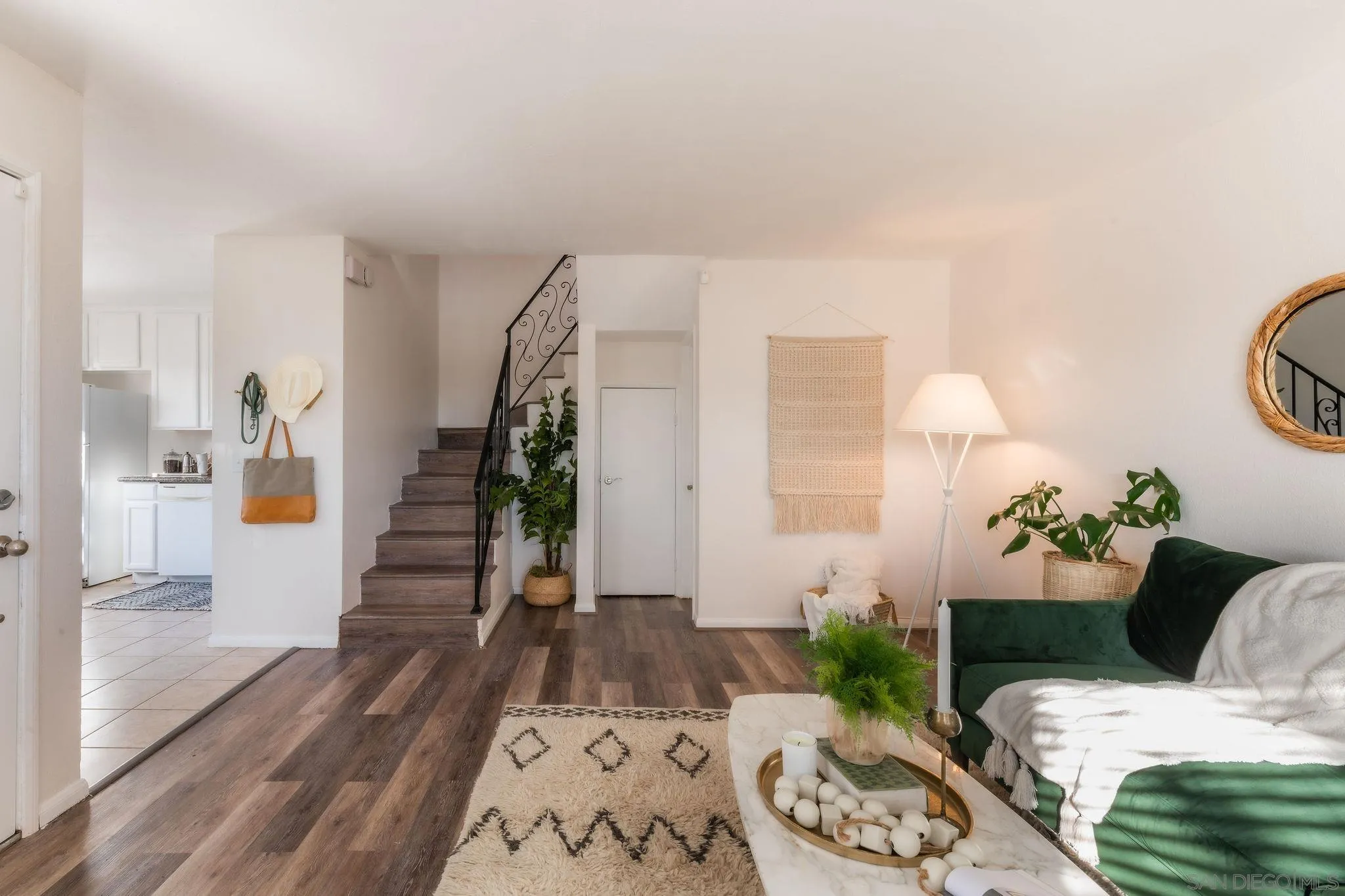 10235 Madrid Way, Unit 138 Spring Valley, CA 91977 - Photo 6 of 21 a living room with furniture and wooden floor
