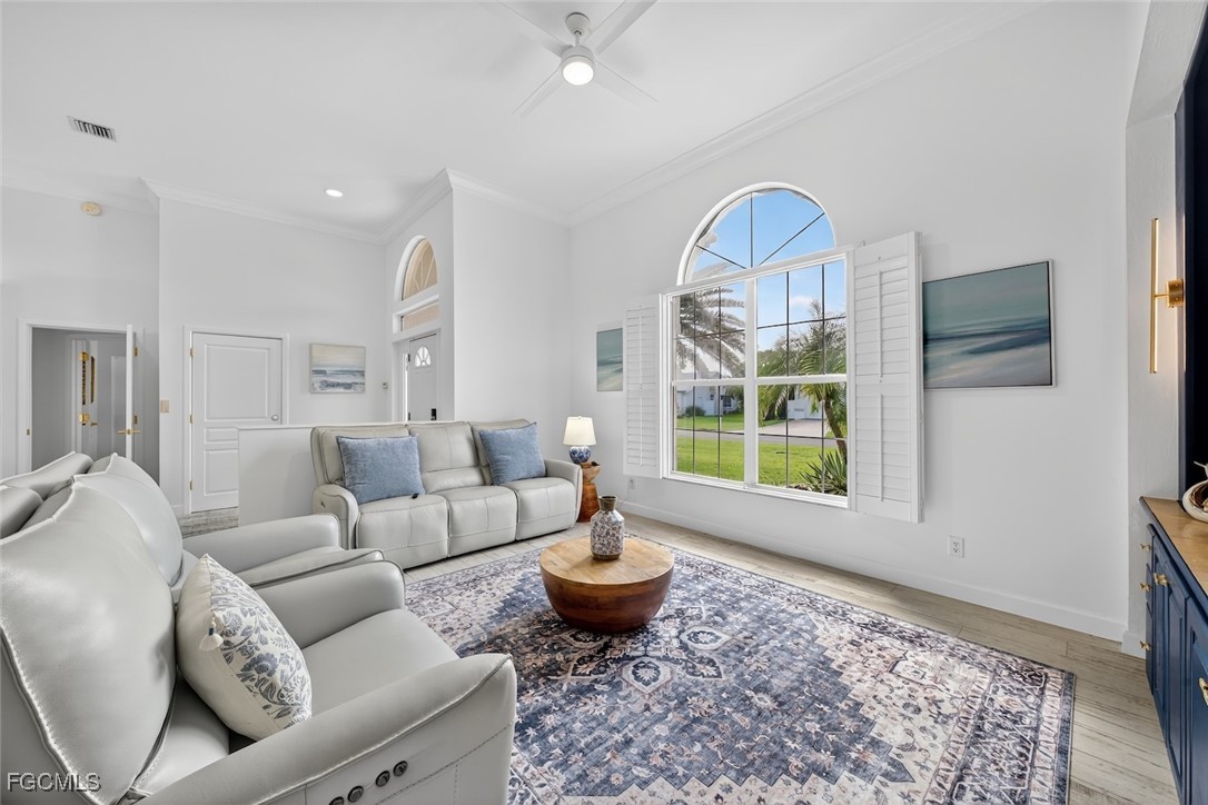 13570 Harbour Ridge Drive Fort Myers, FL 33908 - Photo 6 of 50 a living room with furniture a window and a rug