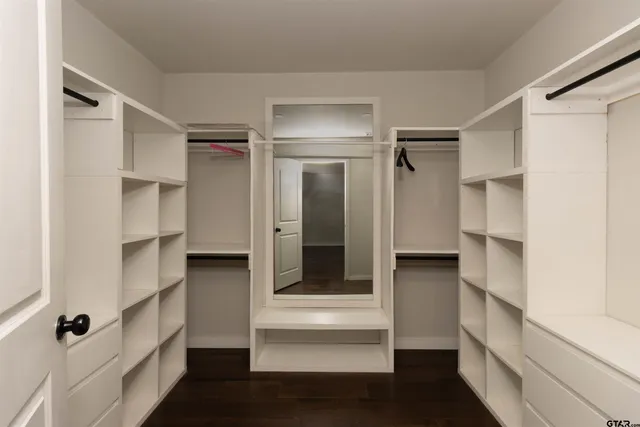 a bathroom with a shower and a sink