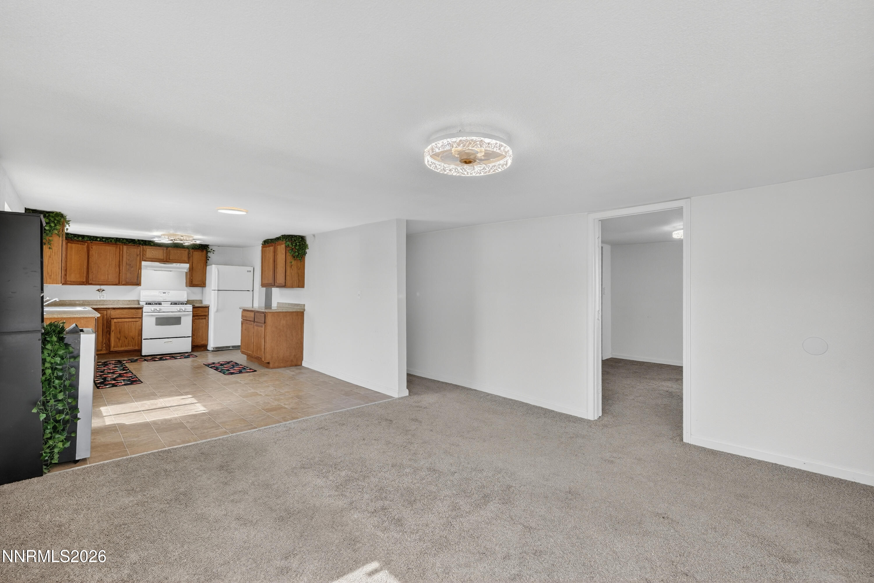 155 Walner Street Reno, NV 89506 - Photo 7 of 20 Living Area looking into Kitchen