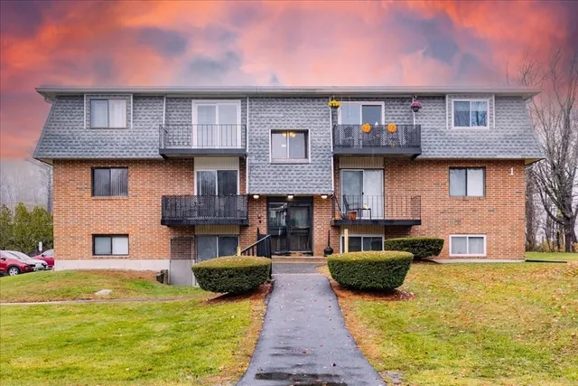 a front view of a house with swimming pool