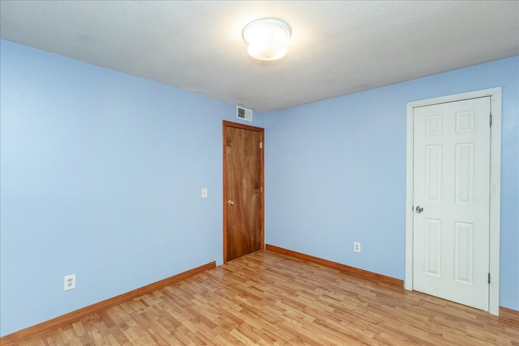 176 Maple Avenue, Unit 138 Rutland, MA 01543 - Photo 19 of 29 an empty room with a window