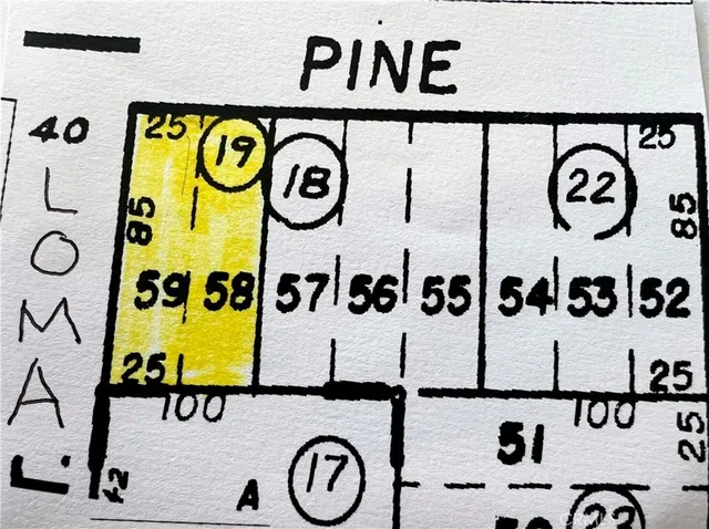 a view of street from balcony