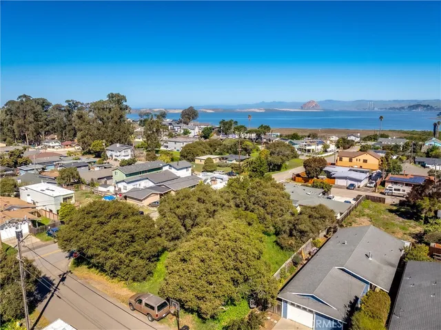 an aerial view of residential houses and outdoor space