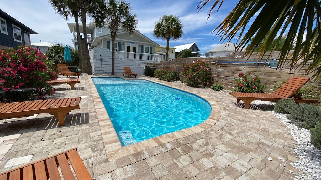 244 Magnolia Street Santa Rosa Beach, FL 32459 - Photo 1 of 32 a view of a backyard with a garden