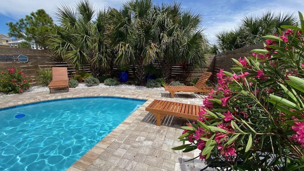 244 Magnolia Street Santa Rosa Beach, FL 32459 - Photo 23 of 32 a view of yard with swimming pool and sitting area