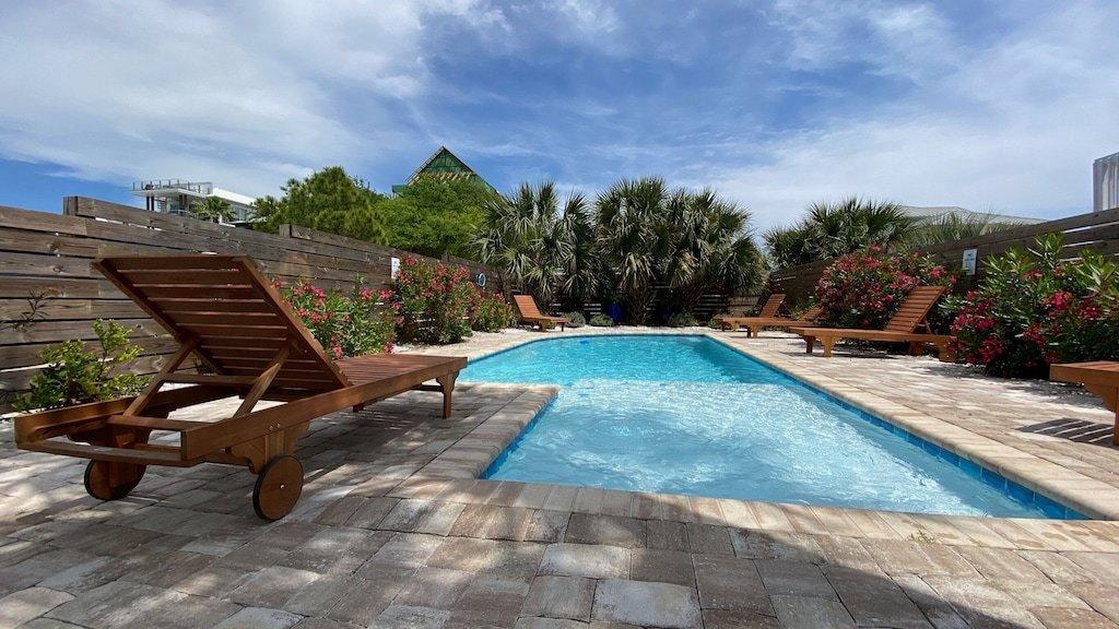 244 Magnolia Street Santa Rosa Beach, FL 32459 - Photo 24 of 32 a view of a backyard with sitting area