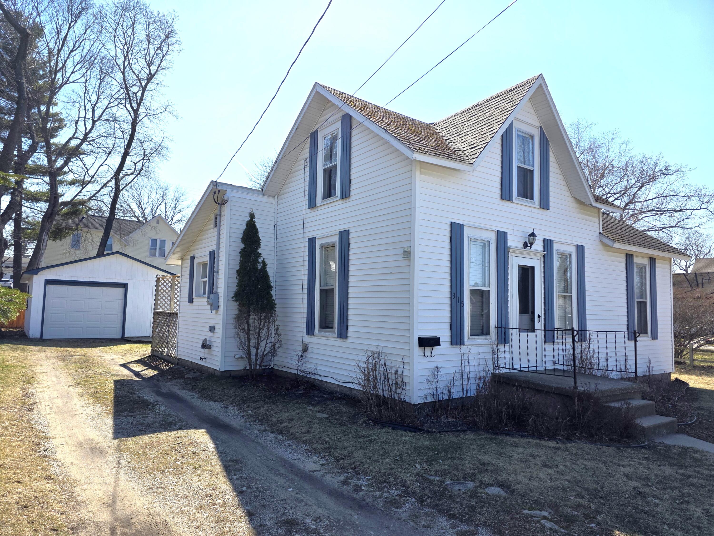 315 4th Avenue Manistee, MI 49660 - Photo 2 of 22 20260407_151809