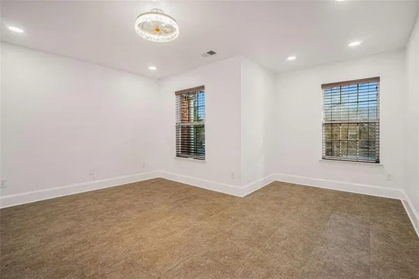 an empty room with windows