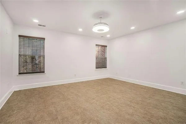 an empty room with windows