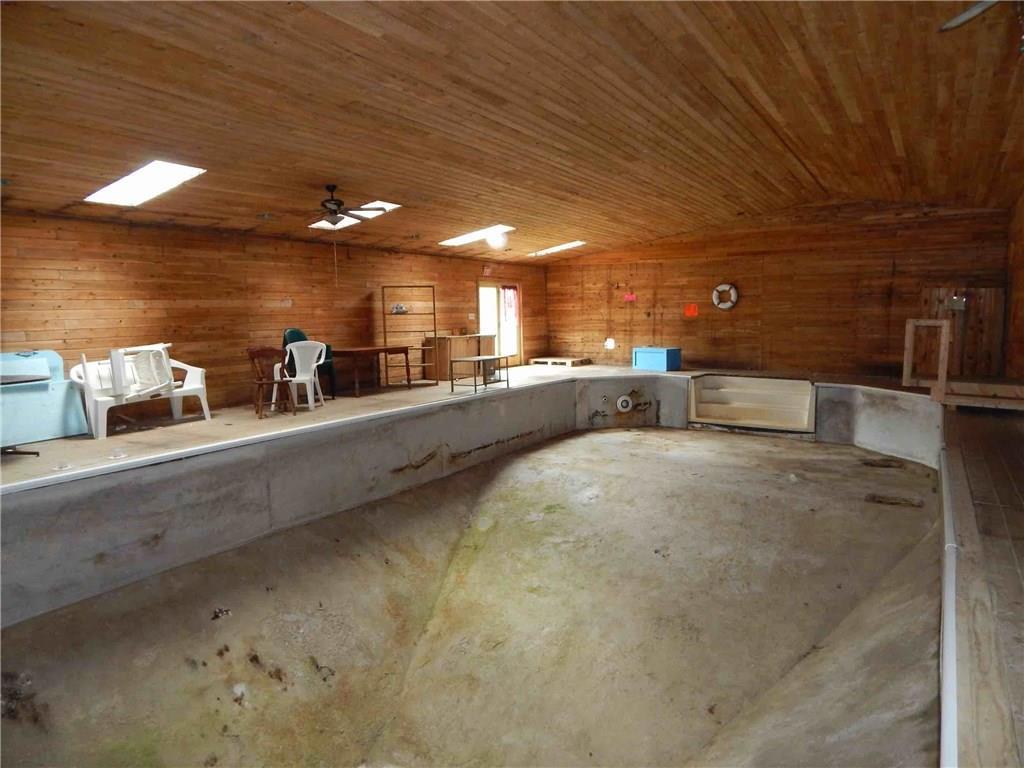153 Woodland Road Princeton, ME 04668 - Photo 1 of 20 Giant indoor pool room with hot tub,...