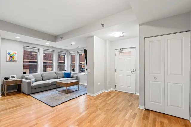 a bedroom with furniture and window