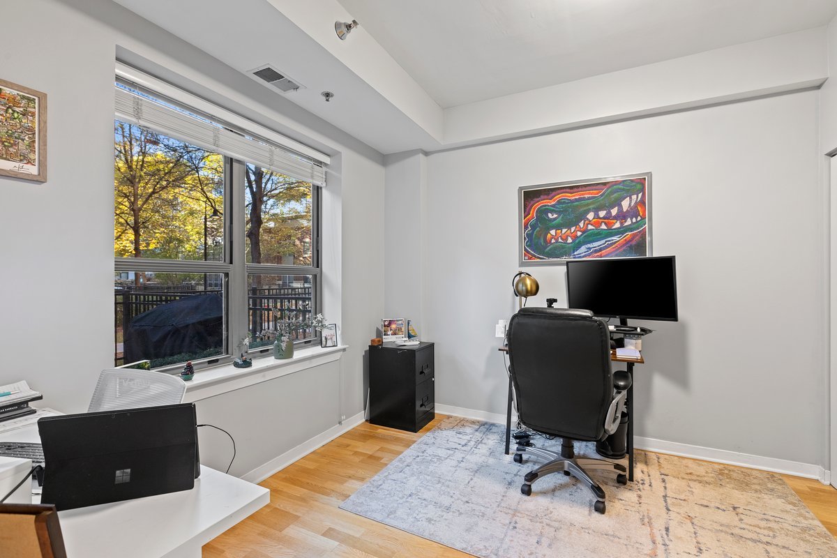 1159 North Hudson Avenue, Unit 6 Chicago, IL 60610 - Photo 8 of 24 a view of a workspace with furniture and a window