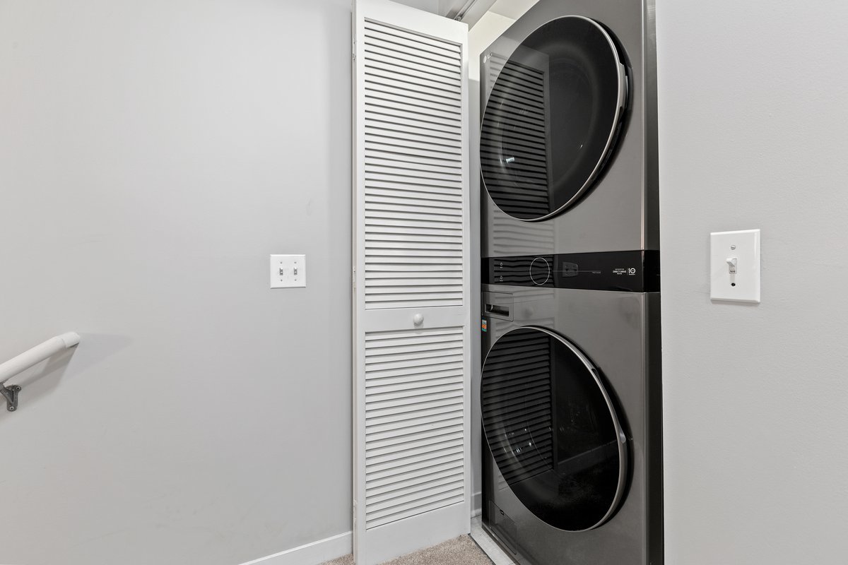 1159 North Hudson Avenue, Unit 6 Chicago, IL 60610 - Photo 10 of 24 a close up view of a washer and dryer