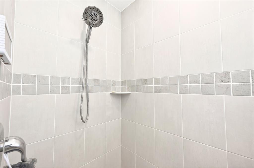 6348 Gardner Road Lakeland, FL 33813 - Photo 17 of 26 a bathroom with a shower