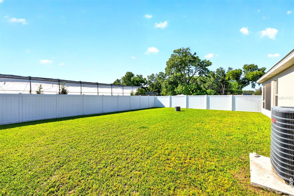 6348 Gardner Road Lakeland, FL 33813 - Photo 25 of 26 a view of an outdoor space and a swimming pool