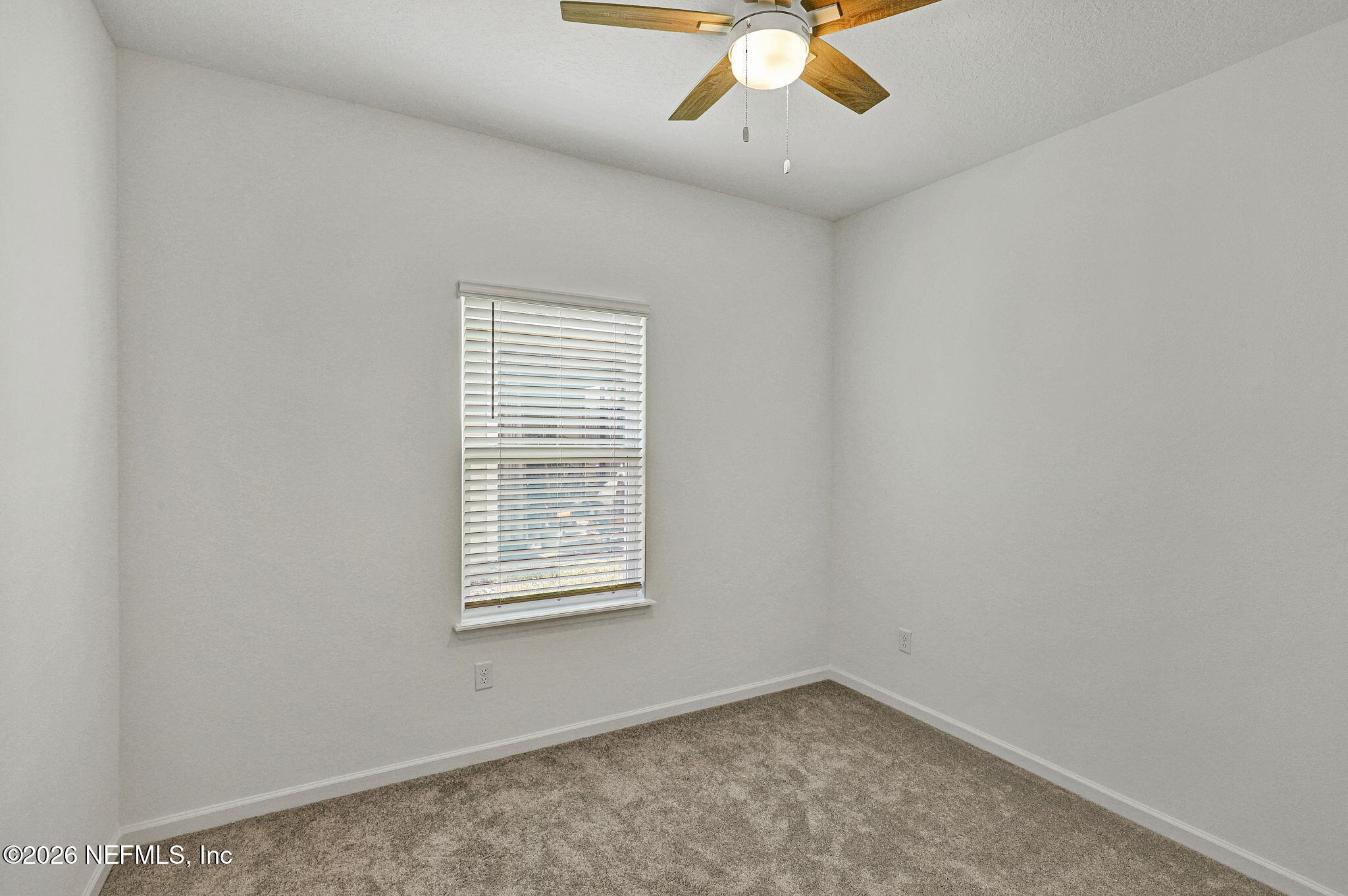 89 Kingsley Pk Way St. Augustine, FL 32084 - Photo 13 of 29 an empty room with a window