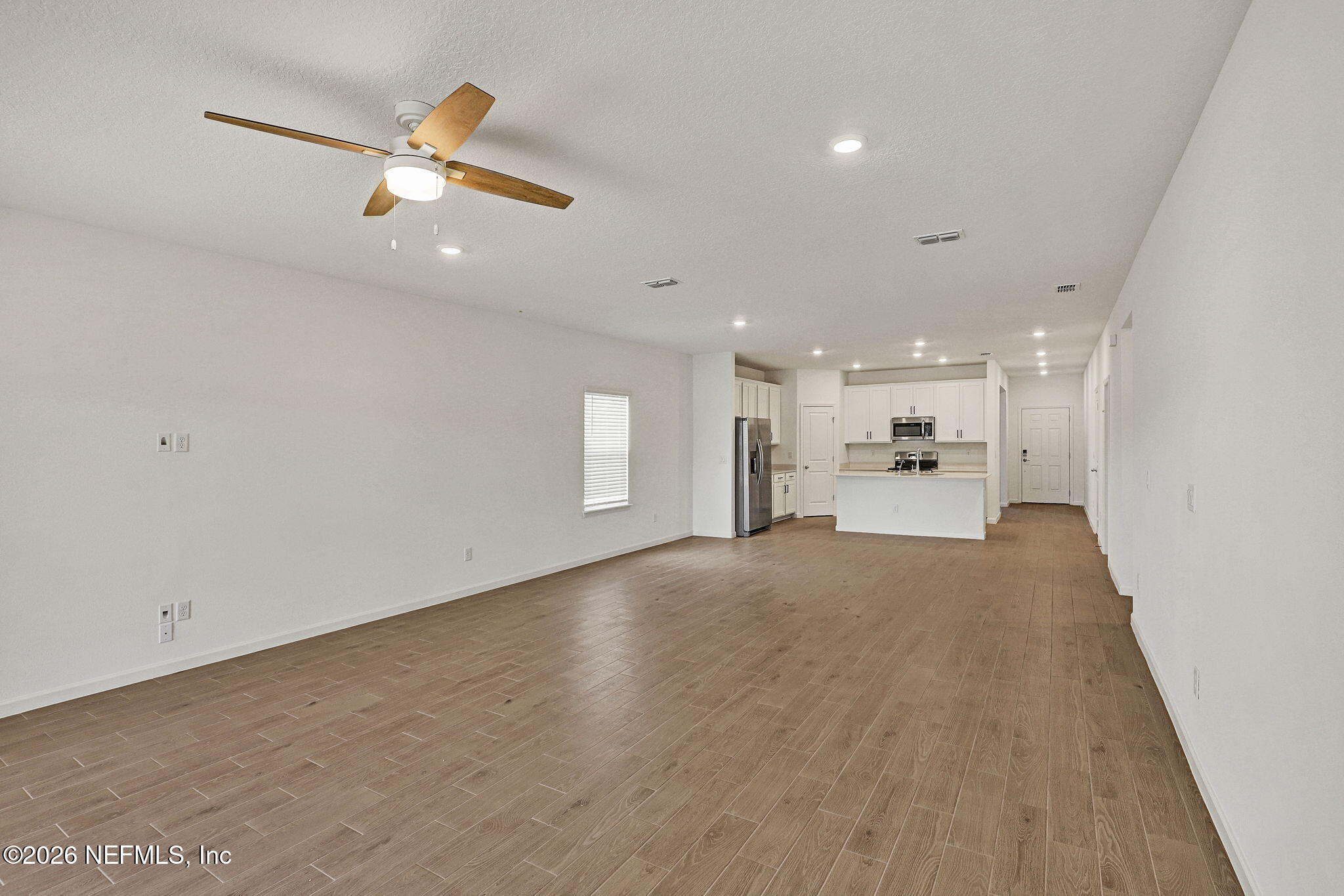 89 Kingsley Pk Way St. Augustine, FL 32084 - Photo 16 of 29 a view of a kitchen with a sink and dishwasher cabinets