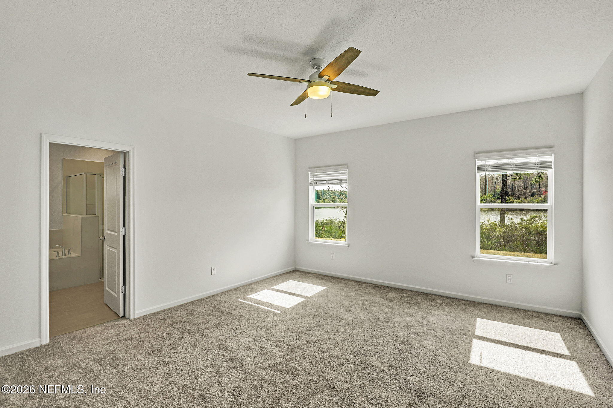 89 Kingsley Pk Way St. Augustine, FL 32084 - Photo 18 of 29 a view of empty room with windows