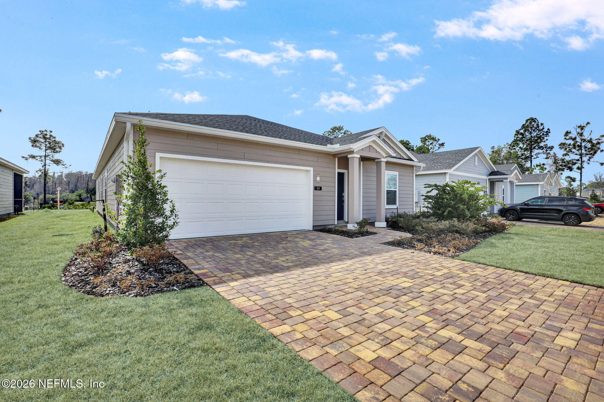 89 Kingsley Pk Way St. Augustine, FL 32084 - Photo 5 of 29 a view of a house with a yard