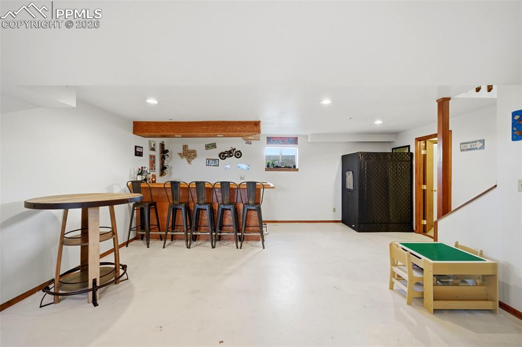 13815 Woodlake Road Elbert, CO 80106 - Photo 20 of 37 a living room with furniture