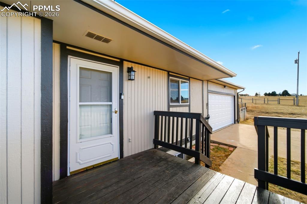 13815 Woodlake Road Elbert, CO 80106 - Photo 4 of 37 a view of deck with patio