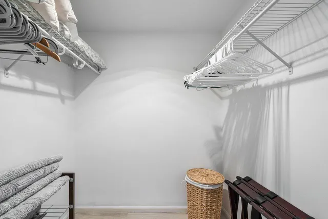 a bathroom with a granite countertop sink mirror and double