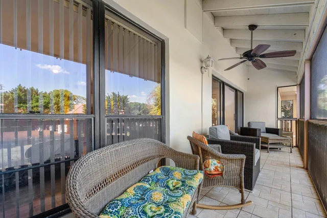 a front view of a house with a yard table and chairs