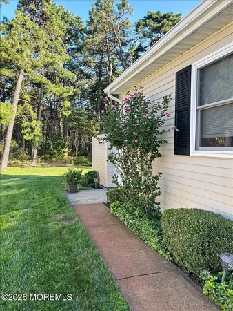 a view of a back yard of the house