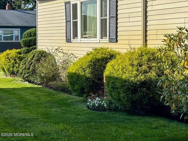 a view of a house with a garden