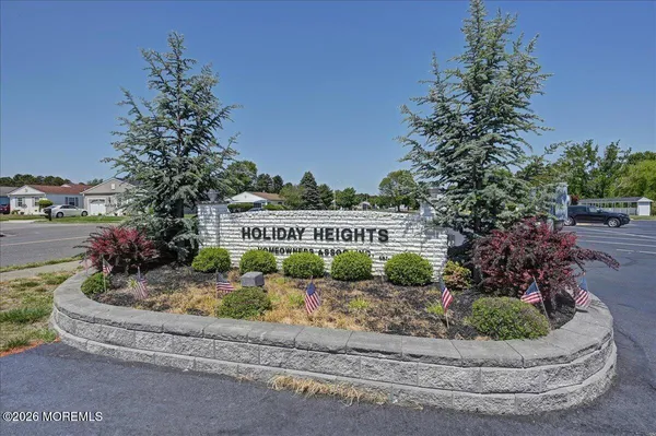 a view of roof deck with furniture
