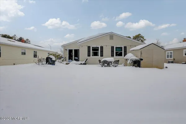 a front view of a house with yard