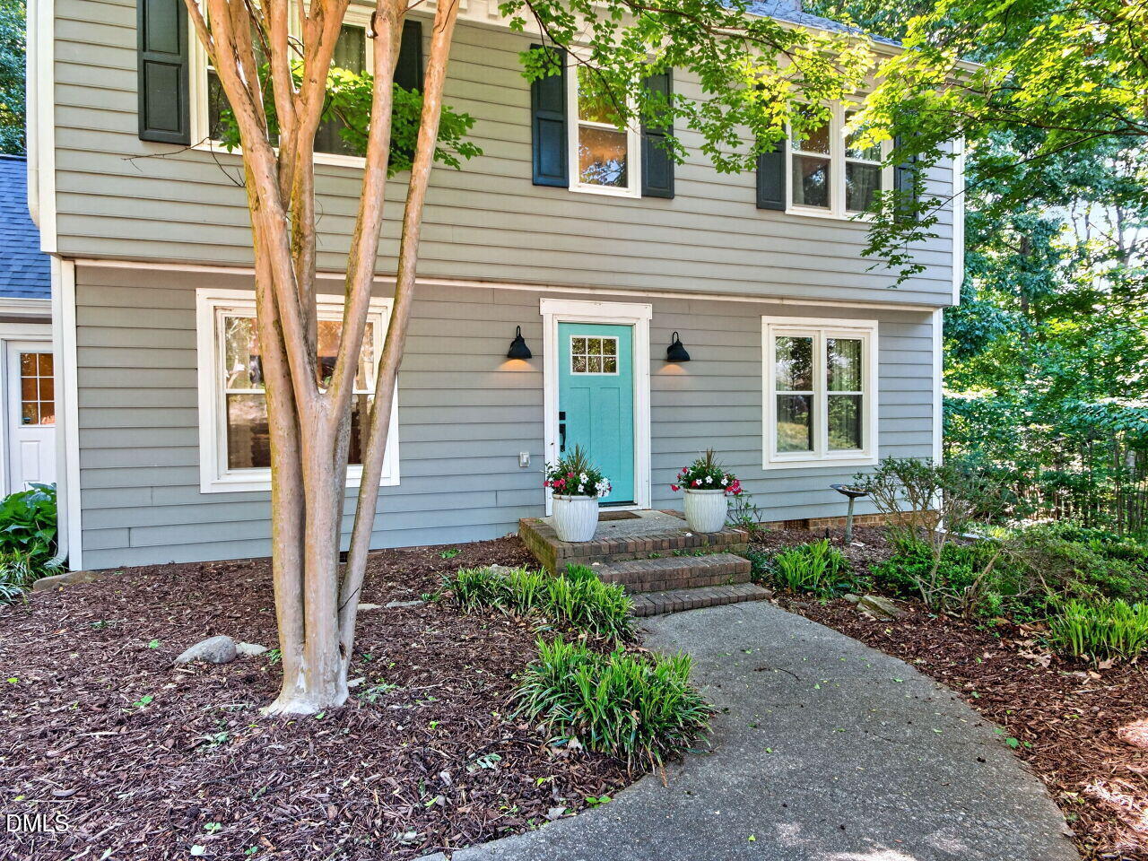 6004 Tarnhour Court Raleigh, NC 27612 - Photo 3 of 44 front walk
