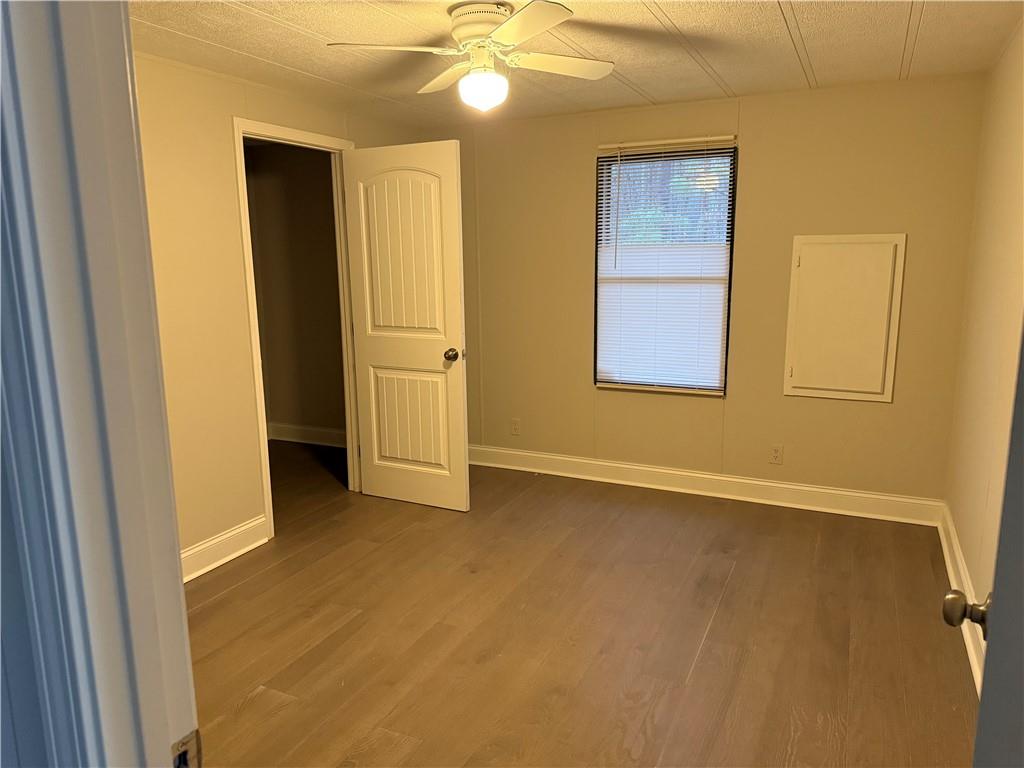 7 Poole Lane Talking Rock, GA 30175 - Photo 17 of 20 an empty room with windows and closet