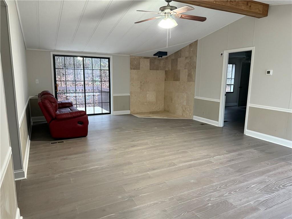 7 Poole Lane Talking Rock, GA 30175 - Photo 8 of 20 wooden floor and windows in a room