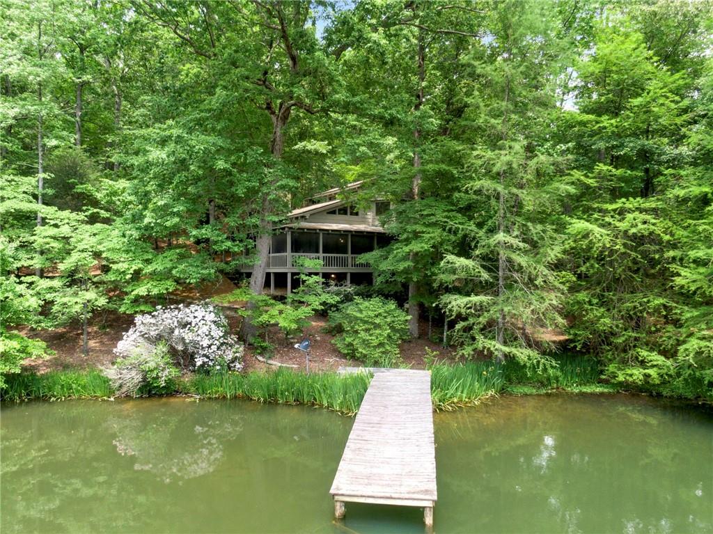 1402 Henderson Mountain Road Jasper, GA 30143 - Photo 13 of 74 a view of backyard with swimming pool and green space
