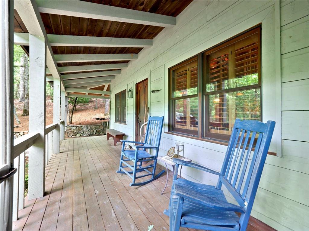 1402 Henderson Mountain Road Jasper, GA 30143 - Photo 59 of 74 a view of a dining room with furniture window and wooden floor