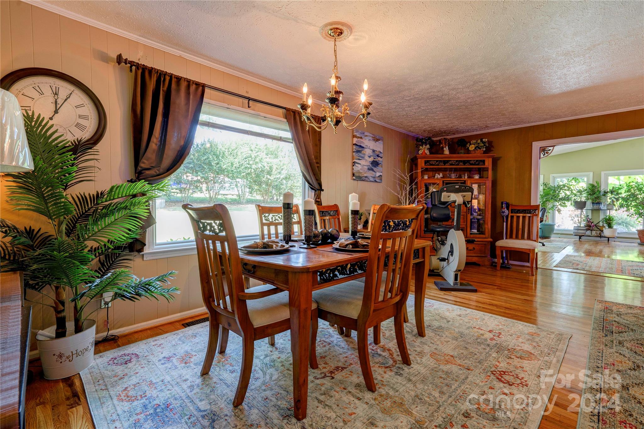 2352 Sheriff Allen Road Shelby, NC 28152 - Photo 11 of 48 a dining room with furniture a large window and wooden floor
